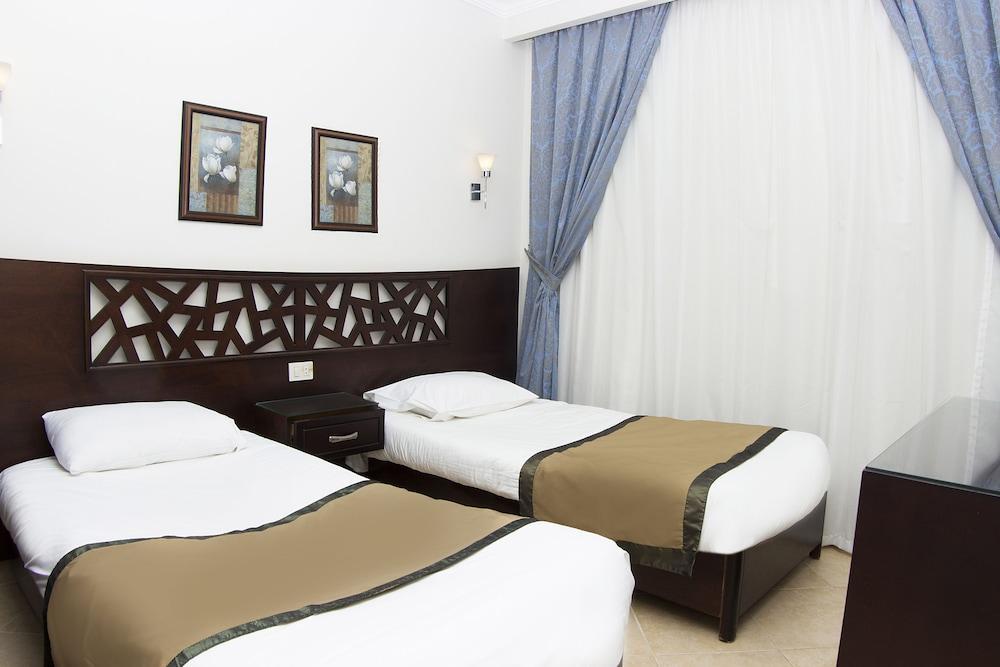 Pyramisa Sunset Pearl Apartments Хургада Экстерьер фото