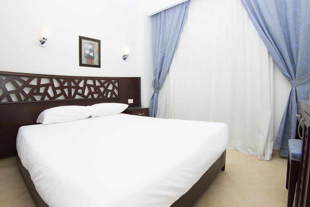 Pyramisa Sunset Pearl Apartments Хургада Экстерьер фото