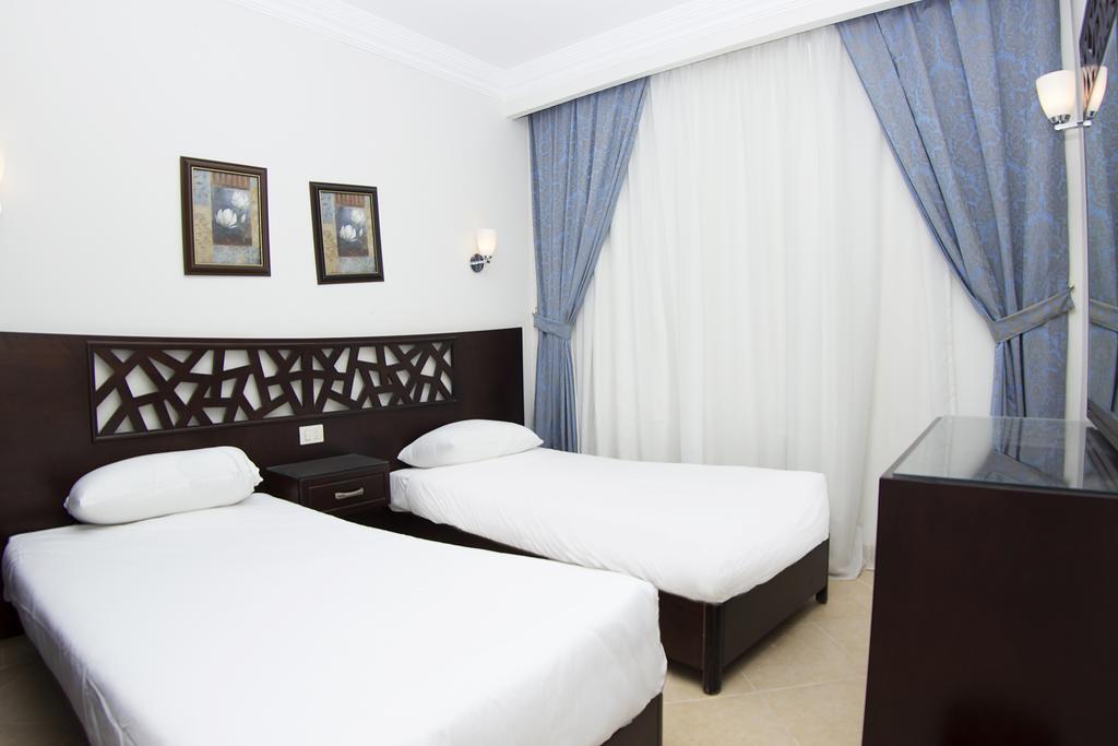Pyramisa Sunset Pearl Apartments Хургада Экстерьер фото