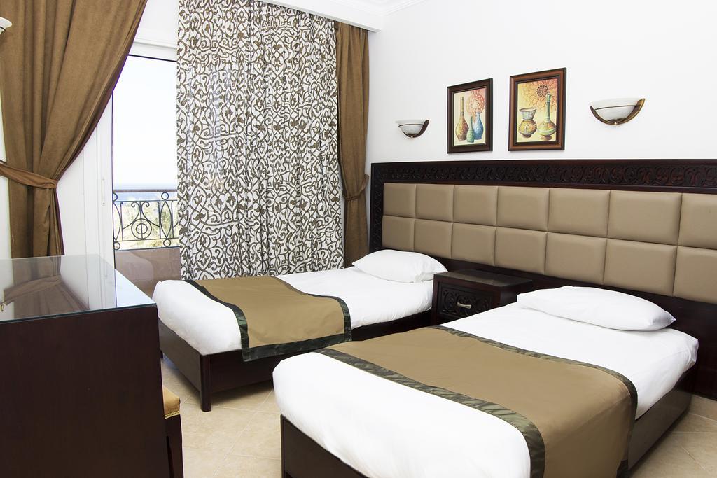Pyramisa Sunset Pearl Apartments Хургада Экстерьер фото